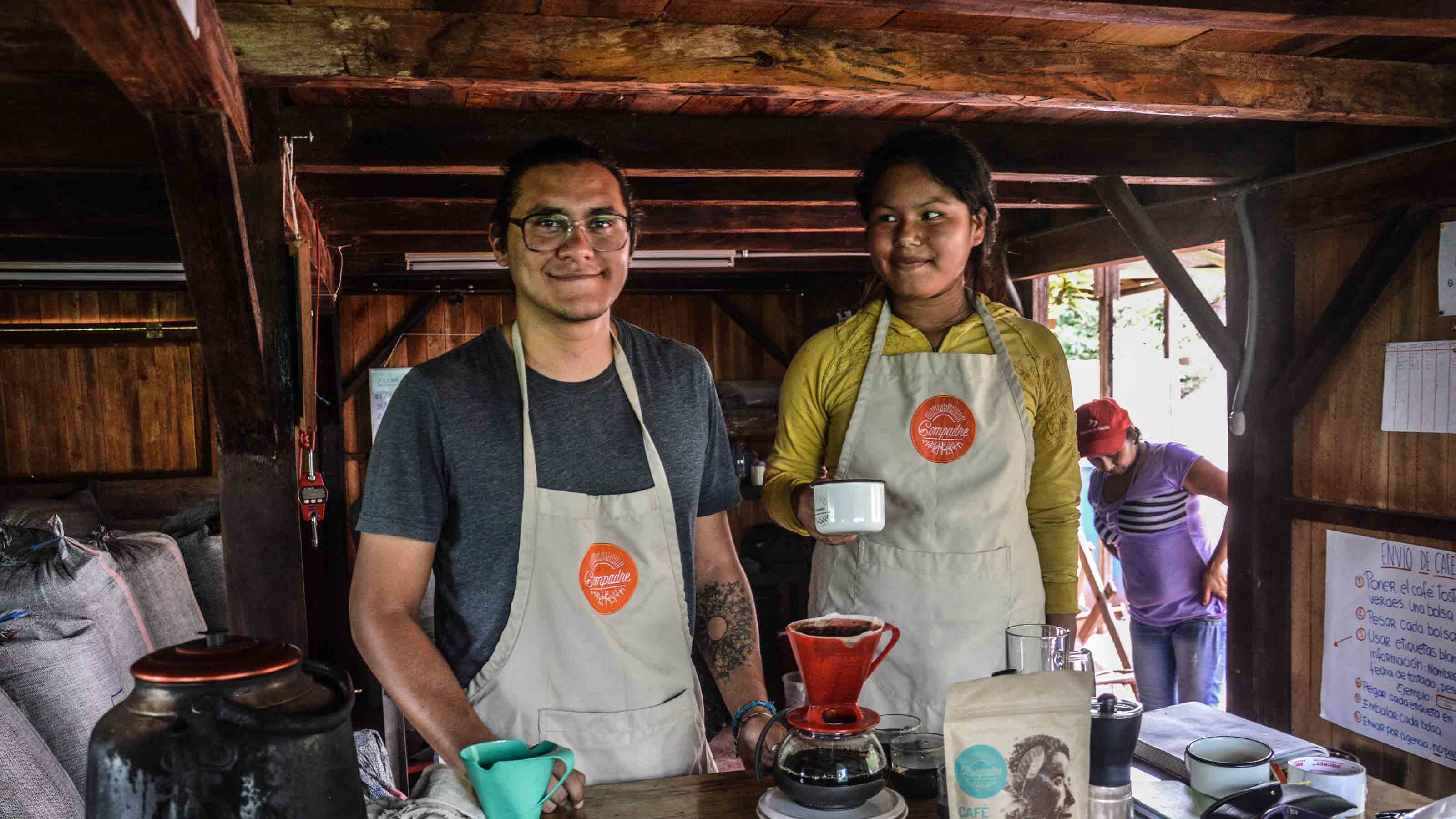 Cafe Compadre coffee attendants posing for the camera