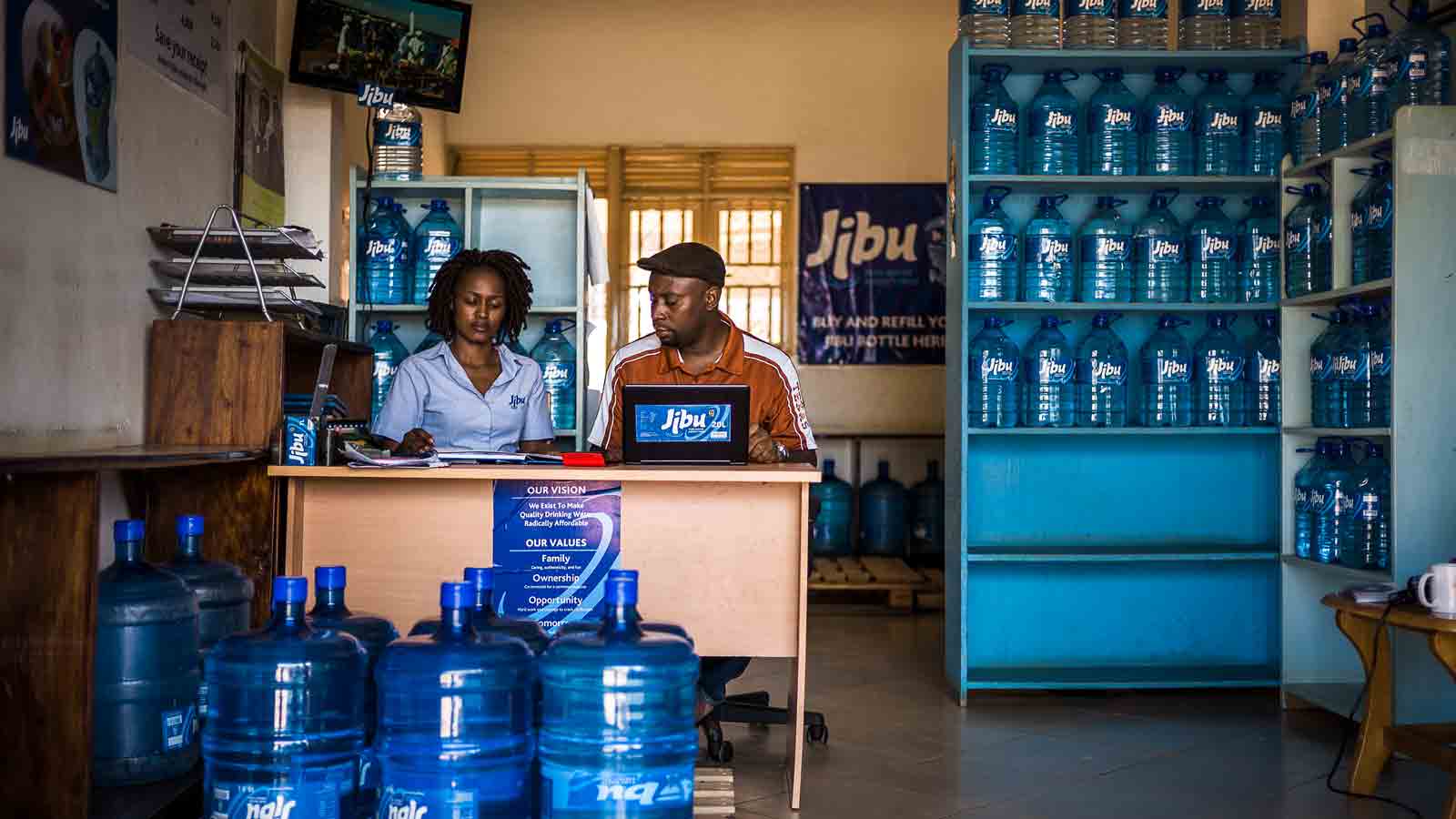 Jibu staff at the counter