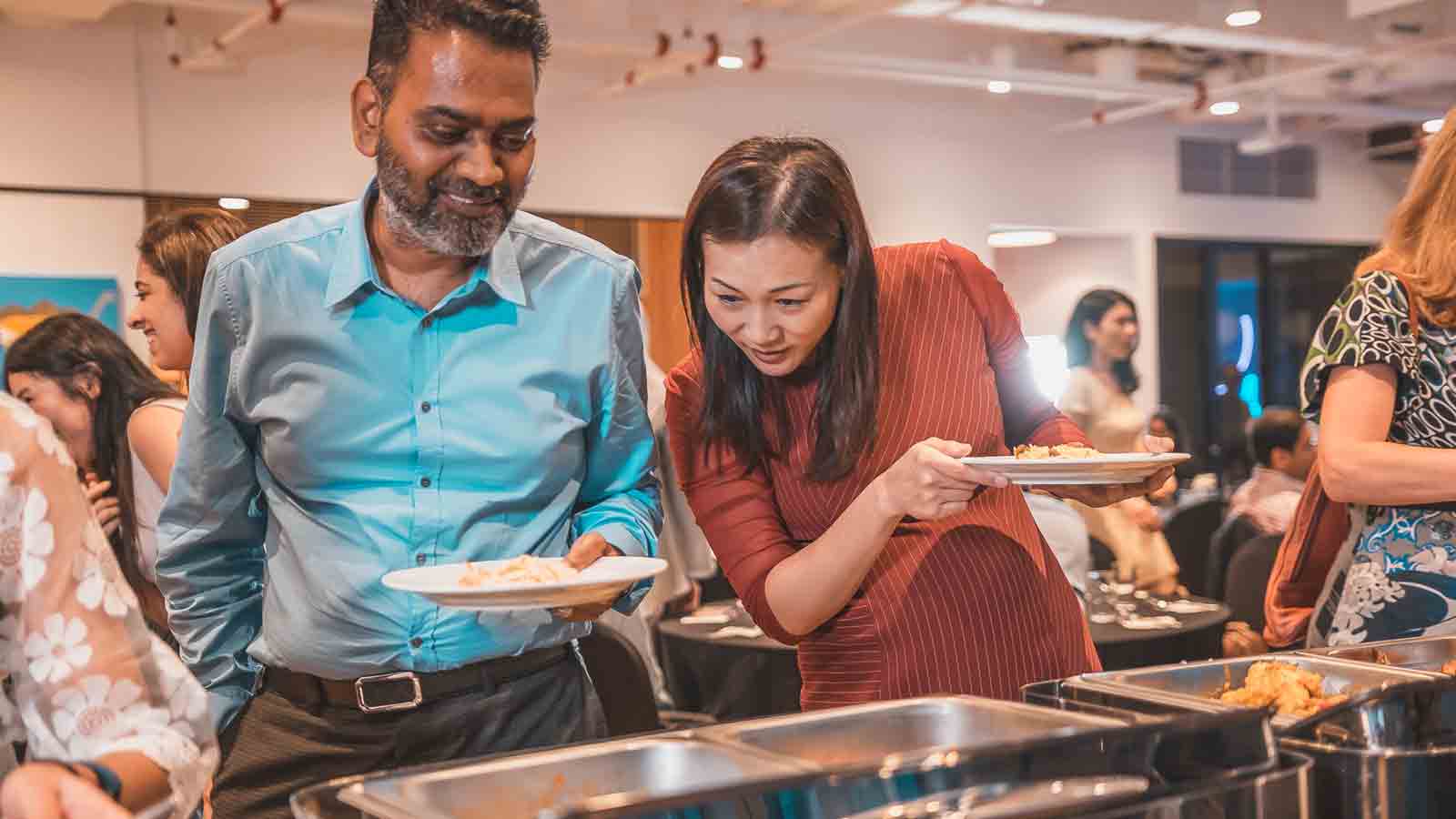 Man and woman at buffet station